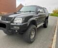Черный Мицубиси Л 200, объемом двигателя 2.5 л и пробегом 150 тыс. км за 6500 $, фото 2 на Automoto.ua