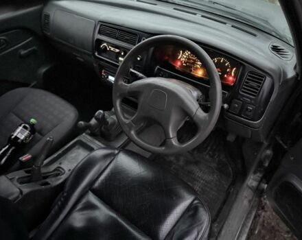 Черный Мицубиси Л 200, объемом двигателя 0 л и пробегом 232 тыс. км за 4100 $, фото 7 на Automoto.ua