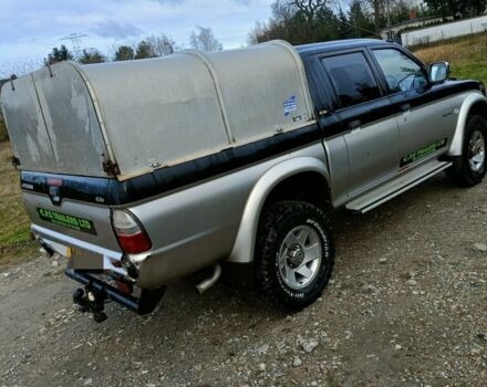 Черный Мицубиси Л 200, объемом двигателя 2.5 л и пробегом 120 тыс. км за 5500 $, фото 21 на Automoto.ua