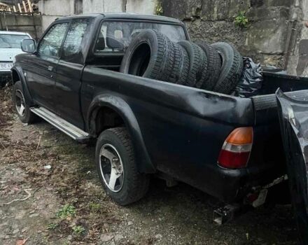 Чорний Міцубісі Л 200, об'ємом двигуна 2.5 л та пробігом 308 тис. км за 5000 $, фото 1 на Automoto.ua