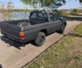 Черный Мицубиси Л 200, объемом двигателя 2.5 л и пробегом 250 тыс. км за 4500 $, фото 1 на Automoto.ua