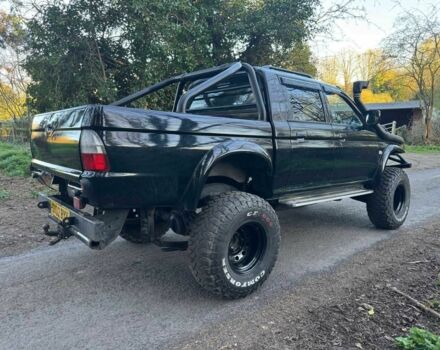 Чорний Міцубісі Л 200, об'ємом двигуна 0 л та пробігом 140 тис. км за 7500 $, фото 3 на Automoto.ua