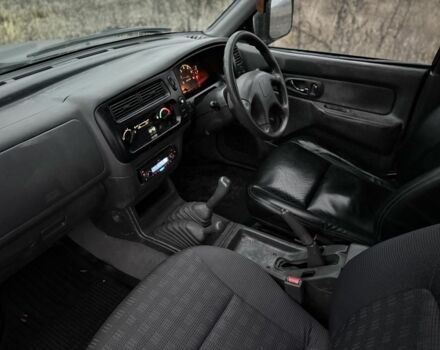 Черный Мицубиси Л 200, объемом двигателя 0 л и пробегом 232 тыс. км за 4100 $, фото 6 на Automoto.ua