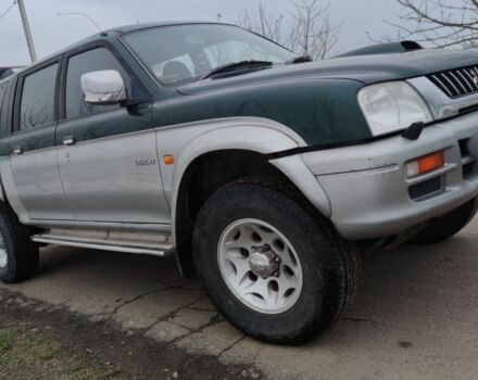 Черный Мицубиси Л 200, объемом двигателя 2.5 л и пробегом 120 тыс. км за 5500 $, фото 18 на Automoto.ua