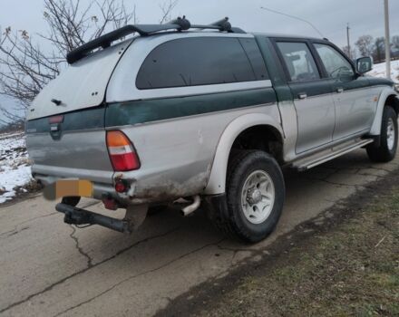 Черный Мицубиси Л 200, объемом двигателя 2.5 л и пробегом 120 тыс. км за 5500 $, фото 15 на Automoto.ua