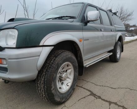 Черный Мицубиси Л 200, объемом двигателя 2.5 л и пробегом 120 тыс. км за 5500 $, фото 11 на Automoto.ua