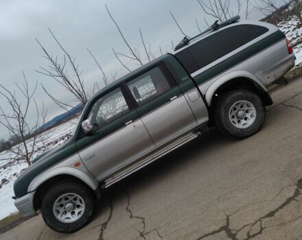 Черный Мицубиси Л 200, объемом двигателя 2.5 л и пробегом 120 тыс. км за 5500 $, фото 1 на Automoto.ua