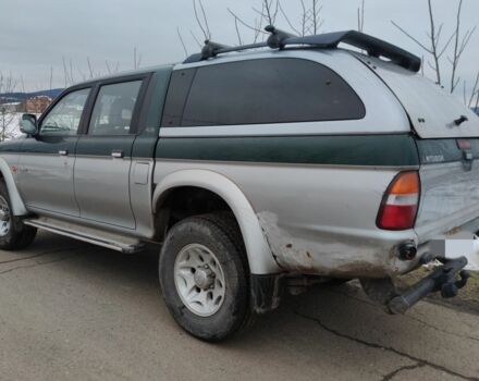 Черный Мицубиси Л 200, объемом двигателя 2.5 л и пробегом 120 тыс. км за 5500 $, фото 19 на Automoto.ua