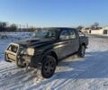 Чорний Міцубісі Л 200, об'ємом двигуна 2.5 л та пробігом 130 тис. км за 5200 $, фото 1 на Automoto.ua