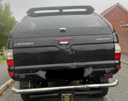 Черный Мицубиси Л 200, объемом двигателя 2.5 л и пробегом 150 тыс. км за 6500 $, фото 6 на Automoto.ua