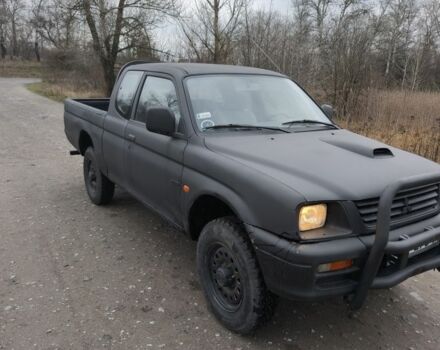 Черный Мицубиси Л 200, объемом двигателя 2.5 л и пробегом 220 тыс. км за 4500 $, фото 10 на Automoto.ua