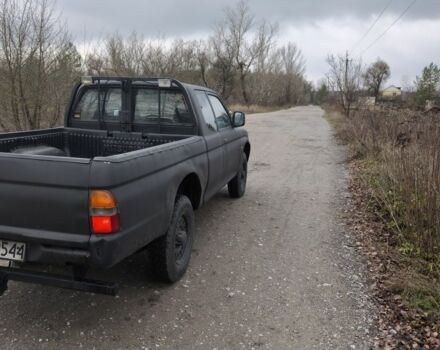 Черный Мицубиси Л 200, объемом двигателя 2.5 л и пробегом 220 тыс. км за 4500 $, фото 7 на Automoto.ua