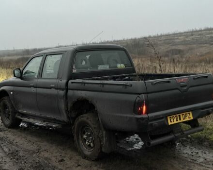 Черный Мицубиси Л 200, объемом двигателя 0 л и пробегом 232 тыс. км за 4100 $, фото 5 на Automoto.ua