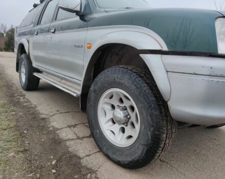 Черный Мицубиси Л 200, объемом двигателя 2.5 л и пробегом 120 тыс. км за 5500 $, фото 13 на Automoto.ua