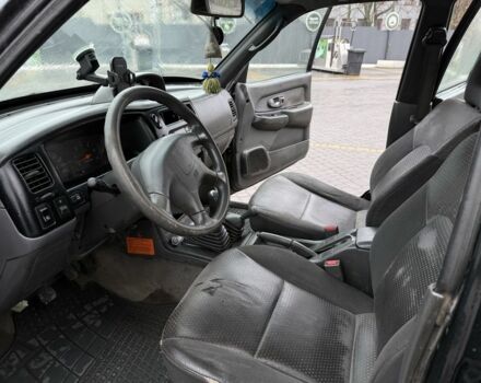 Черный Мицубиси Л 200, объемом двигателя 2.5 л и пробегом 355 тыс. км за 4500 $, фото 5 на Automoto.ua