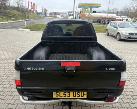 Чорний Міцубісі Л 200, об'ємом двигуна 2.5 л та пробігом 167 тис. км за 6647 $, фото 5 на Automoto.ua