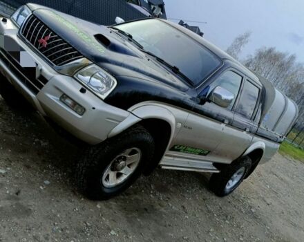 Чорний Міцубісі Л 200, об'ємом двигуна 2.5 л та пробігом 160 тис. км за 5600 $, фото 2 на Automoto.ua