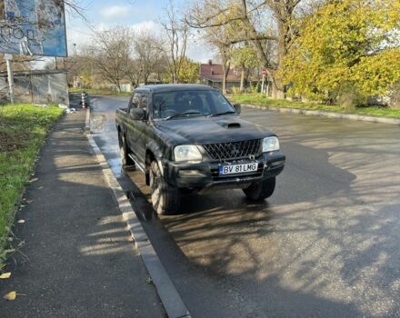 Черный Мицубиси Л 200, объемом двигателя 2.5 л и пробегом 270 тыс. км за 3500 $, фото 6 на Automoto.ua