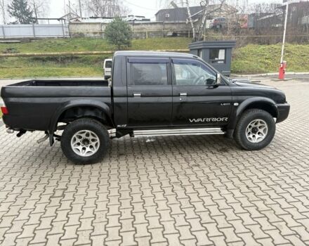 Чорний Міцубісі Л 200, об'ємом двигуна 2.5 л та пробігом 167 тис. км за 6647 $, фото 7 на Automoto.ua