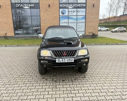 Чорний Міцубісі Л 200, об'ємом двигуна 2.5 л та пробігом 167 тис. км за 6647 $, фото 2 на Automoto.ua