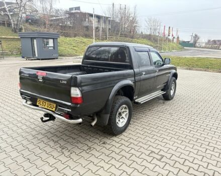 Чорний Міцубісі Л 200, об'ємом двигуна 2.5 л та пробігом 167 тис. км за 6647 $, фото 6 на Automoto.ua