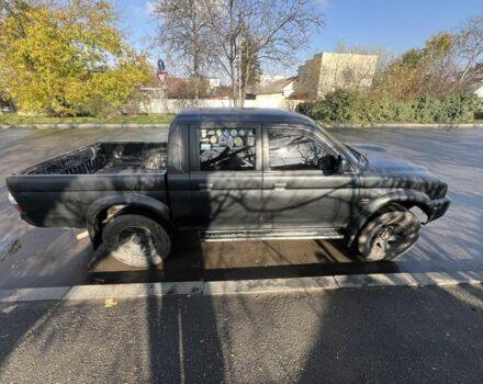 Черный Мицубиси Л 200, объемом двигателя 2.5 л и пробегом 270 тыс. км за 3500 $, фото 1 на Automoto.ua