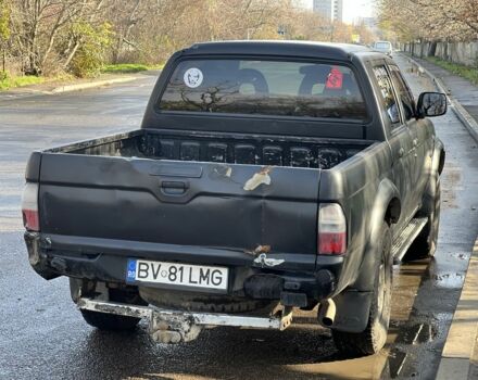 Черный Мицубиси Л 200, объемом двигателя 2.5 л и пробегом 270 тыс. км за 3500 $, фото 4 на Automoto.ua