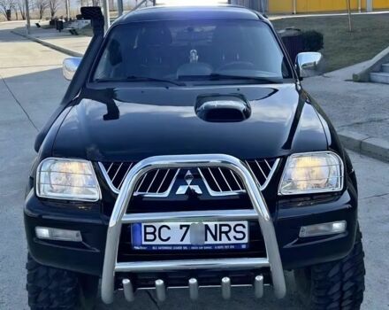 Мицубиси Л 200 2003 в Сумах на Automoto.ua Черный Мицубиси Л 200, объемом двигателя 2.5 л и пробегом 255 тыс. км за 2500 $, фото 3 на Automoto.ua