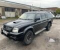 Черный Мицубиси Л 200, объемом двигателя 2.5 л и пробегом 266 тыс. км за 4898 $, фото 1 на Automoto.ua