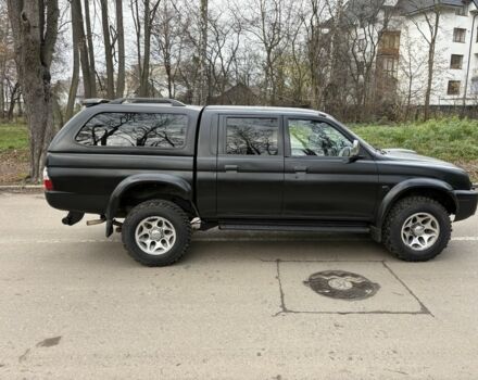 Чорний Міцубісі Л 200, об'ємом двигуна 2.5 л та пробігом 167 тис. км за 5674 $, фото 1 на Automoto.ua