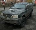Черный Мицубиси Л 200, объемом двигателя 0 л и пробегом 300 тыс. км за 5000 $, фото 1 на Automoto.ua