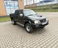 Чорний Міцубісі Л 200, об'ємом двигуна 2.5 л та пробігом 167 тис. км за 6647 $, фото 1 на Automoto.ua