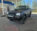 Черный Мицубиси Л 200, объемом двигателя 2.5 л и пробегом 270 тыс. км за 5200 $, фото 1 на Automoto.ua