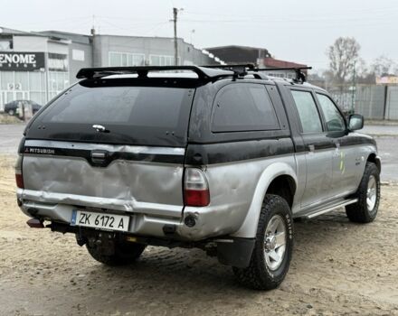 Черный Мицубиси Л 200, объемом двигателя 2.5 л и пробегом 355 тыс. км за 4500 $, фото 2 на Automoto.ua
