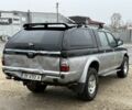 Черный Мицубиси Л 200, объемом двигателя 2.5 л и пробегом 355 тыс. км за 4500 $, фото 2 на Automoto.ua