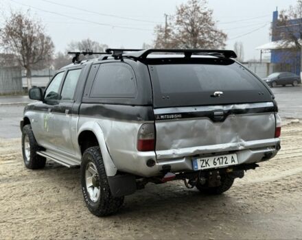 Черный Мицубиси Л 200, объемом двигателя 2.5 л и пробегом 355 тыс. км за 4500 $, фото 3 на Automoto.ua