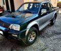Чорний Міцубісі Л 200, об'ємом двигуна 2.5 л та пробігом 221 тис. км за 3400 $, фото 1 на Automoto.ua