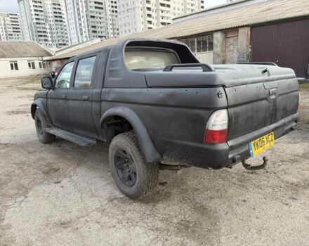 Мицубиси Л 200 2003 в Харькове на Automoto.ua Черный Мицубиси Л 200, объемом двигателя 3.2 л и пробегом 280 тыс. км за 3000 $, фото 5 на Automoto.ua