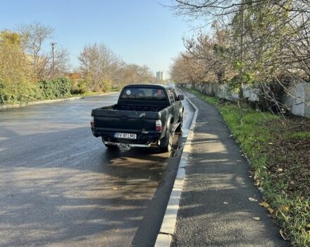 Черный Мицубиси Л 200, объемом двигателя 2.5 л и пробегом 270 тыс. км за 3500 $, фото 5 на Automoto.ua