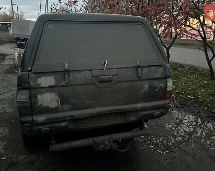 Черный Мицубиси Л 200, объемом двигателя 0 л и пробегом 300 тыс. км за 5000 $, фото 3 на Automoto.ua