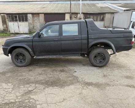 Мицубиси Л 200 2003 в Харькове на Automoto.ua Черный Мицубиси Л 200, объемом двигателя 3.2 л и пробегом 280 тыс. км за 3000 $, фото 4 на Automoto.ua