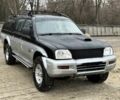 Черный Мицубиси Л 200, объемом двигателя 2.5 л и пробегом 355 тыс. км за 4500 $, фото 1 на Automoto.ua