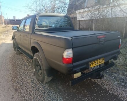 Черный Мицубиси Л 200, объемом двигателя 2.5 л и пробегом 200 тыс. км за 5000 $, фото 3 на Automoto.ua