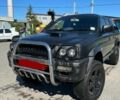Черный Мицубиси Л 200, объемом двигателя 2.5 л и пробегом 225 тыс. км за 4450 $, фото 1 на Automoto.ua