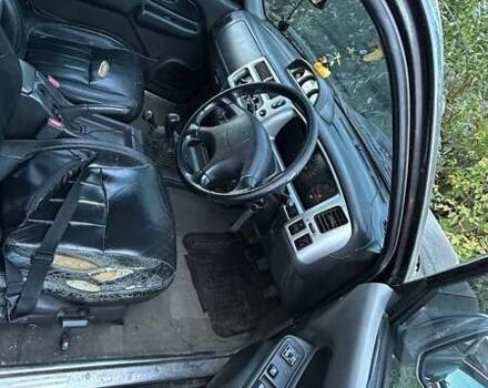 Чорний Міцубісі Л 200, об'ємом двигуна 2.5 л та пробігом 240 тис. км за 6054 $, фото 4 на Automoto.ua