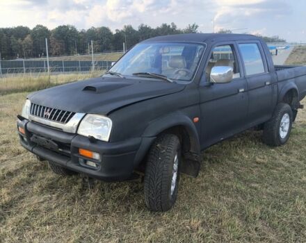 Черный Мицубиси Л 200, объемом двигателя 0 л и пробегом 150 тыс. км за 4667 $, фото 15 на Automoto.ua