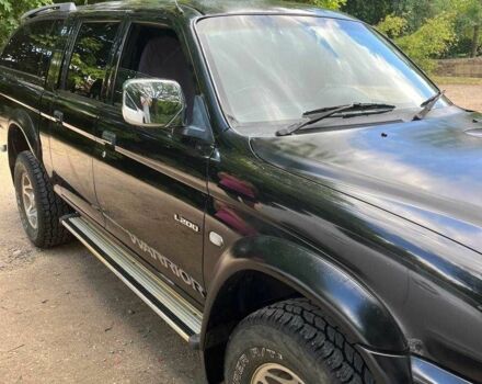 Черный Мицубиси Л 200, объемом двигателя 0 л и пробегом 150 тыс. км за 4667 $, фото 11 на Automoto.ua