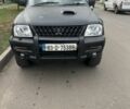 Чорний Міцубісі Л 200, об'ємом двигуна 2.5 л та пробігом 250 тис. км за 2995 $, фото 1 на Automoto.ua
