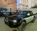 Черный Мицубиси Л 200, объемом двигателя 2.5 л и пробегом 213 тыс. км за 4700 $, фото 1 на Automoto.ua