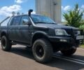 Черный Мицубиси Л 200, объемом двигателя 2.5 л и пробегом 293 тыс. км за 3500 $, фото 1 на Automoto.ua
